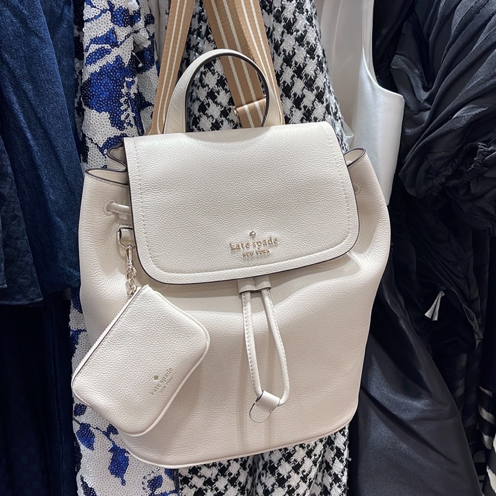 Kate Spade Rosie Medium Flap Backpack 
K8714 pebbled leather Parchment rosie
NWT - Picture 2 of 16